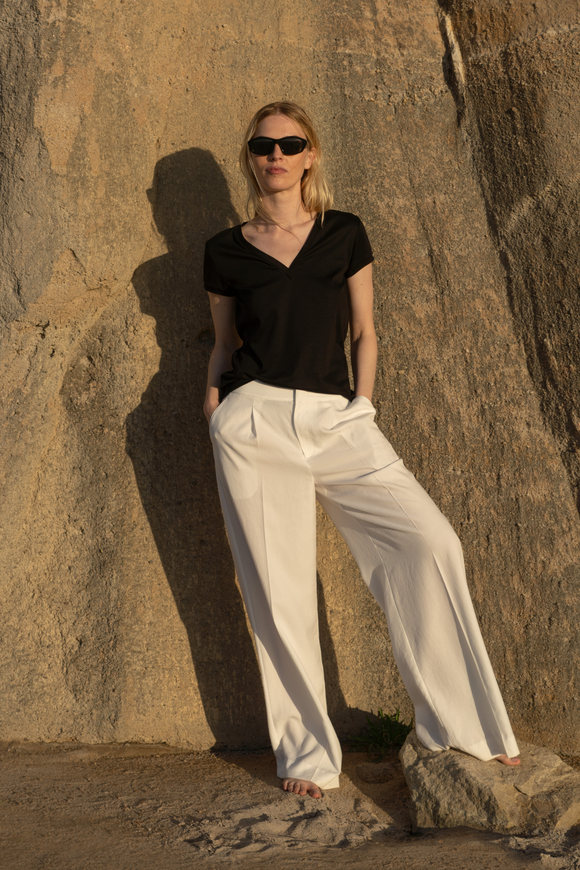 Elegant black cotton-silk t-shirt with V neckline featuring timeless quality and essential luxury