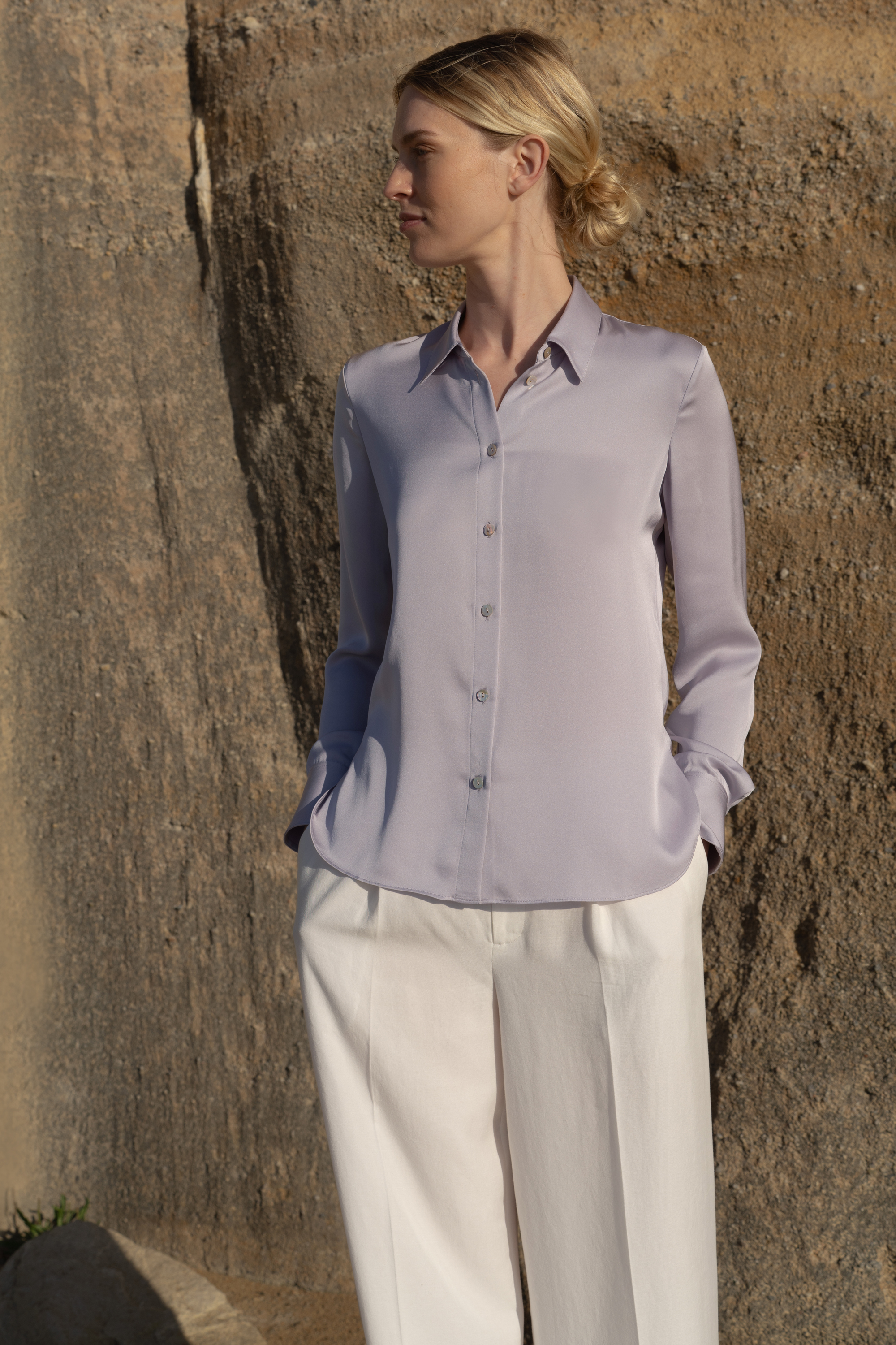 Elegant light purple silk blouse featuring timeless quality and essential luxury.
