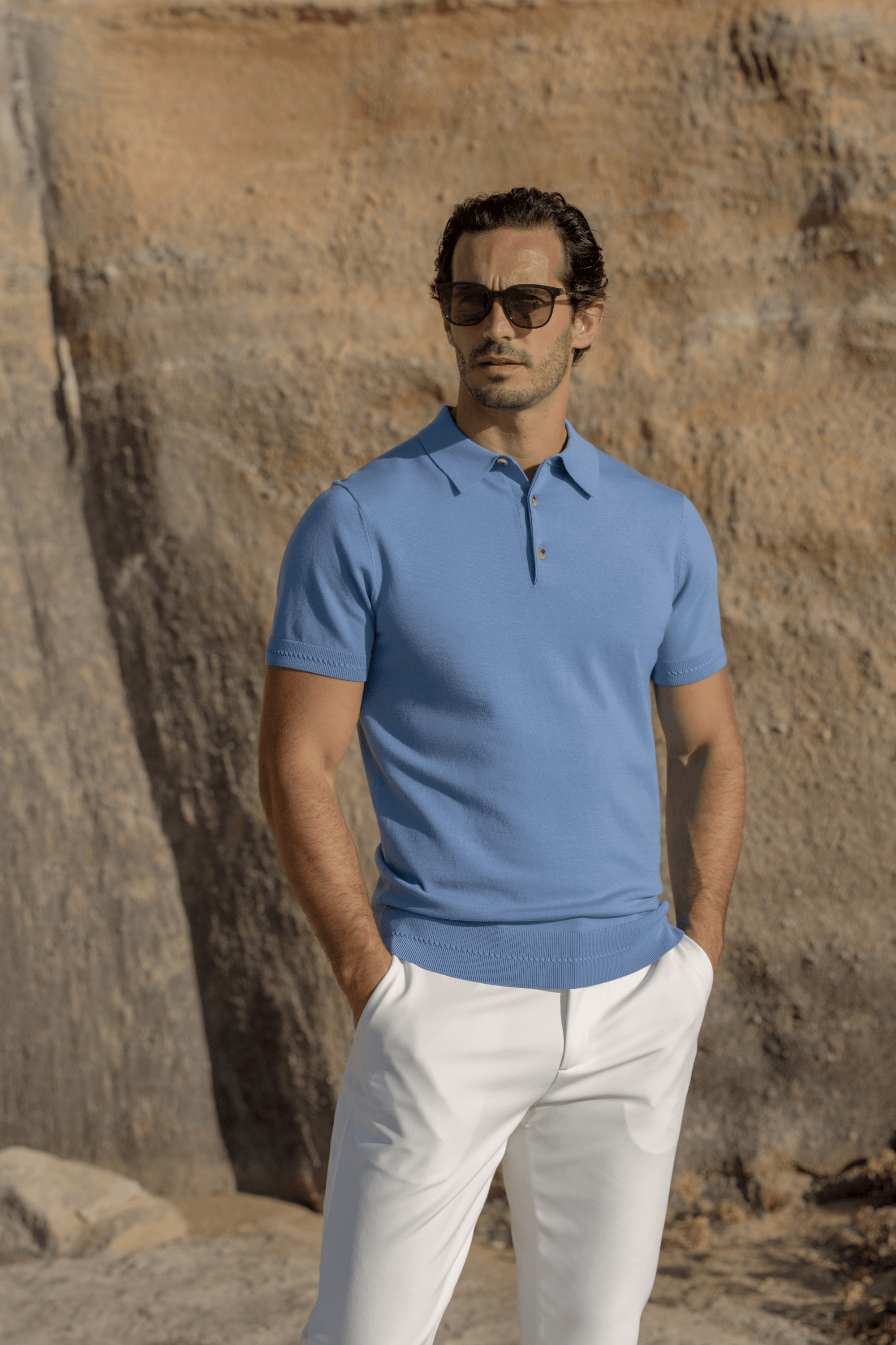 Timeless royal blue knitted polo displaying quality craftsmanship and elegant design.